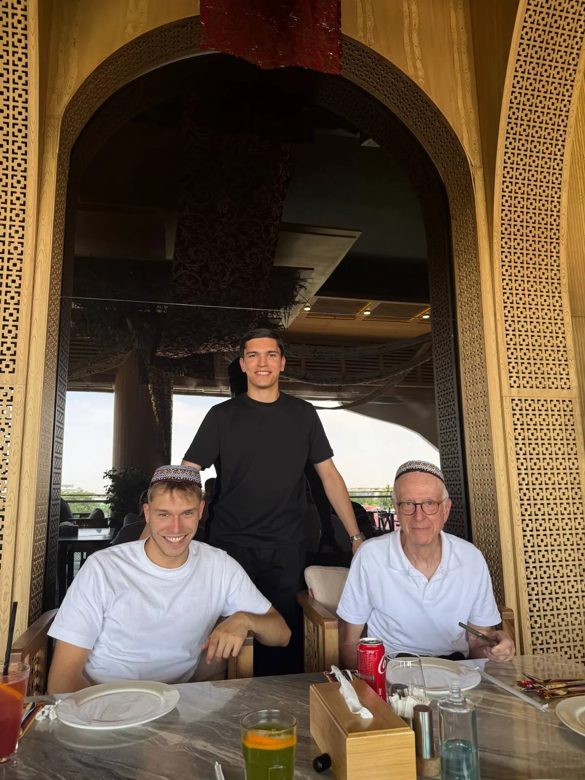Guests enjoying local food in Turkmenistan